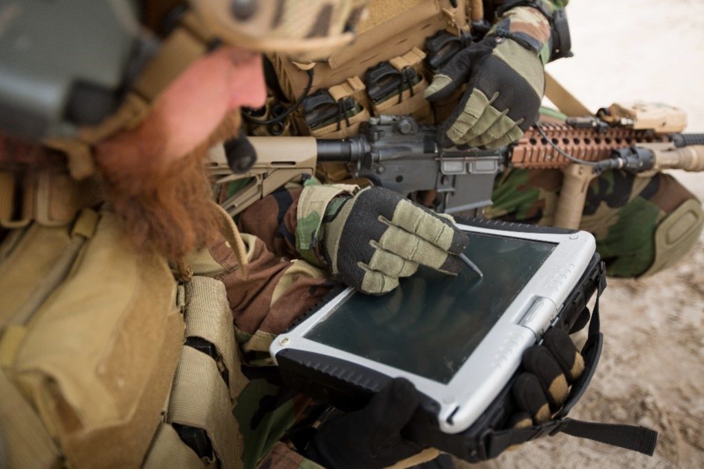 Soldiers use a rugged tablet with a stylus pen