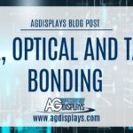 A blurred, abstract background with interconnected lines and data points in shades of blue and white, overlaid with a white banner stating "AGDISPLAYS BLOG POST" at the top, followed by "OCA, OPTICAL AND TAPE BONDING," and the AGDisplays logo with "www.agdisplays.com" at the bottom.
